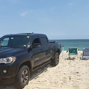 truck on beach.webp